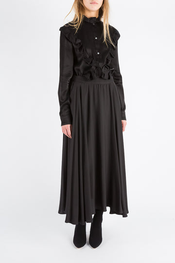 Opal | Skirt | Black. Flowy circle skirt with gathering at the waistband. Side pockets and invisible side zip. Fitted, model wears 36.