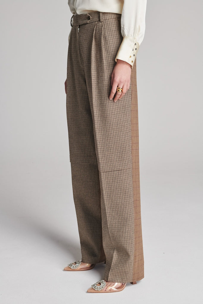 Straight pants that combine two grandpa-inspired check-suiting fabrics. Features pockets, belt loops, and pressed creases. True to size.
