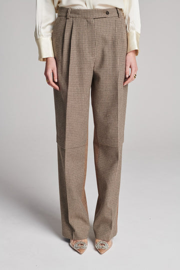 Straight pants that combine two grandpa-inspired check-suiting fabrics. Features pockets, belt loops, and pressed creases. True to size.