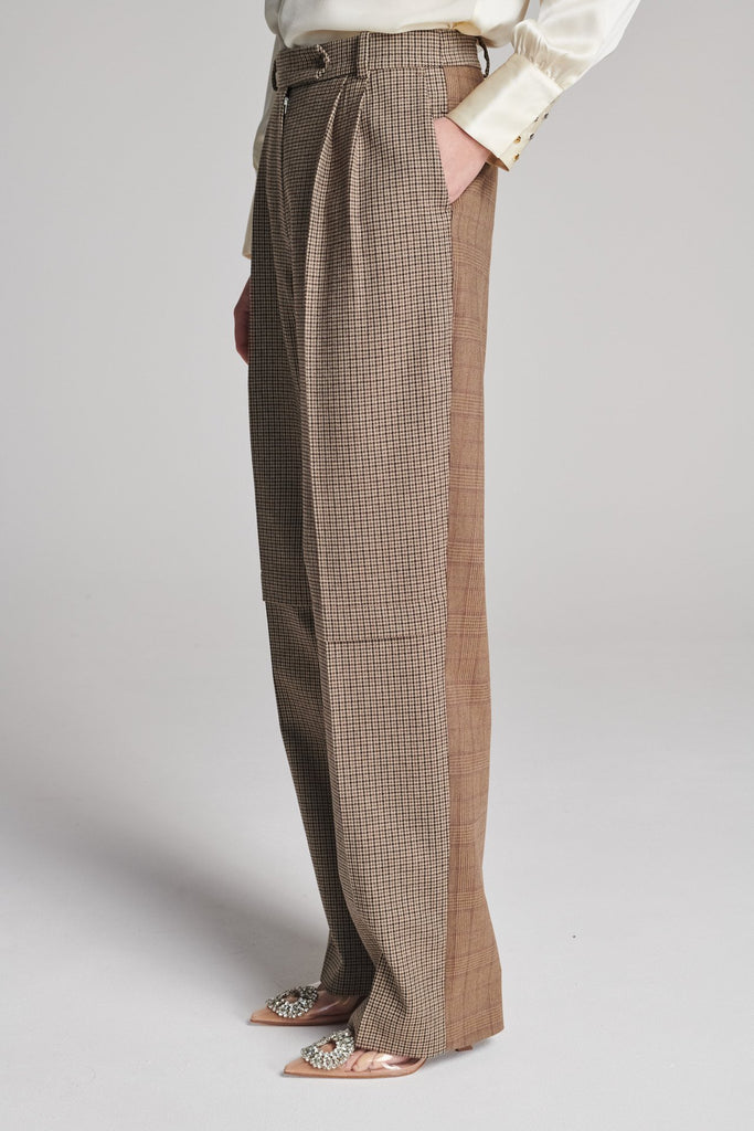 Straight pants that combine two grandpa-inspired check-suiting fabrics. Features pockets, belt loops, and pressed creases. True to size.