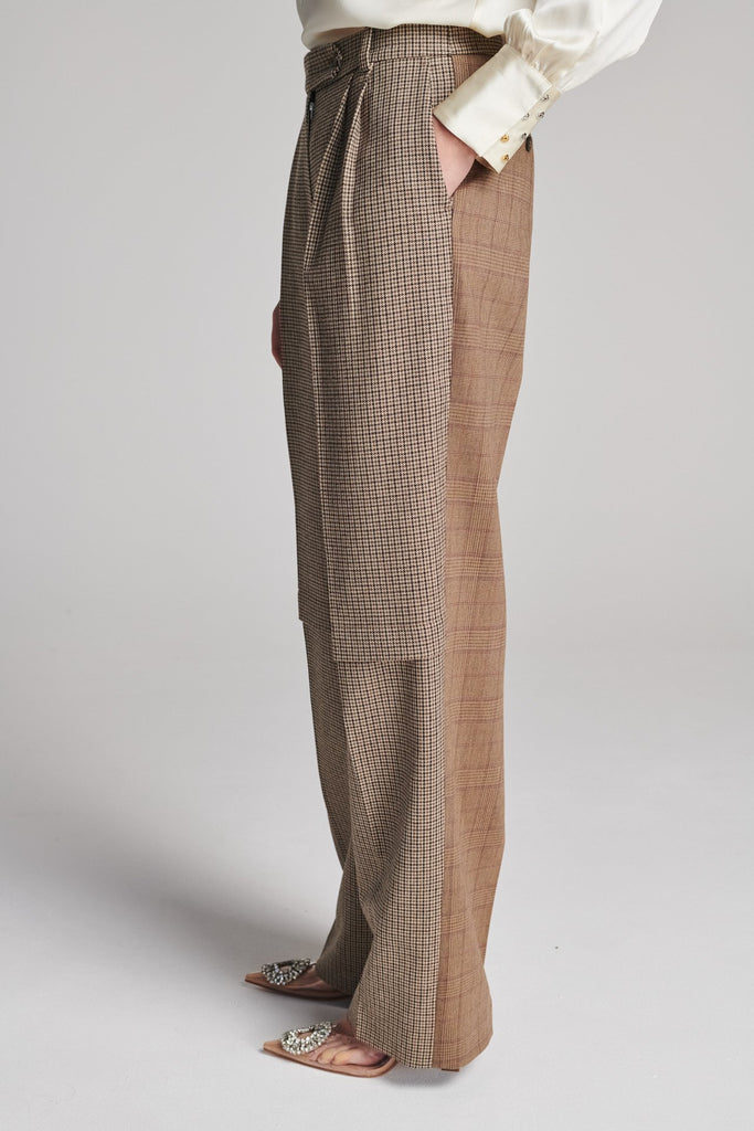 Straight pants that combine two grandpa-inspired check-suiting fabrics. Features pockets, belt loops, and pressed creases. True to size.