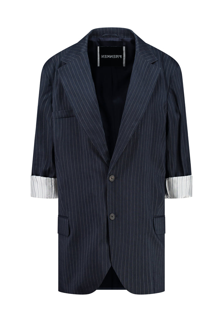 Creative Director Erik Frenken is a master of designing cool and this blazer is no exception. This will be your everyday treasure. Perfectly tailored blazer cut from faintly pinstriped linen blend. Detailed with flap pockets, squared horn button fastenings and viscose satin lining. Fits oversized. Roll up the sleeves for an effortless look, lifting every outfit.