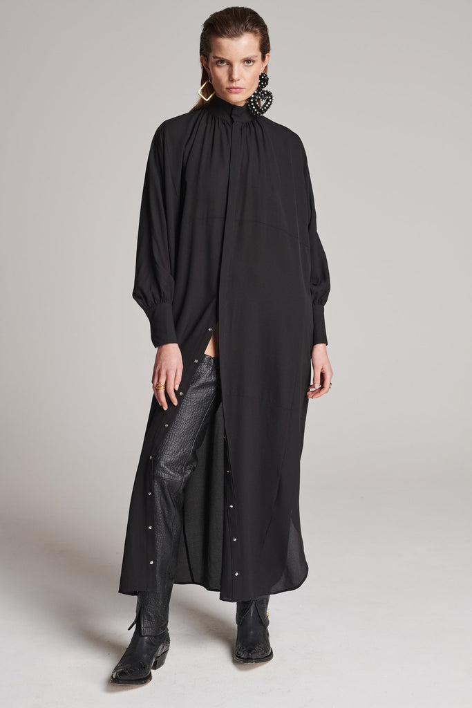 Silk maxi shirt-dress. Features turtleneck, snap buttons and adjustable cuffs. Fits oversized.