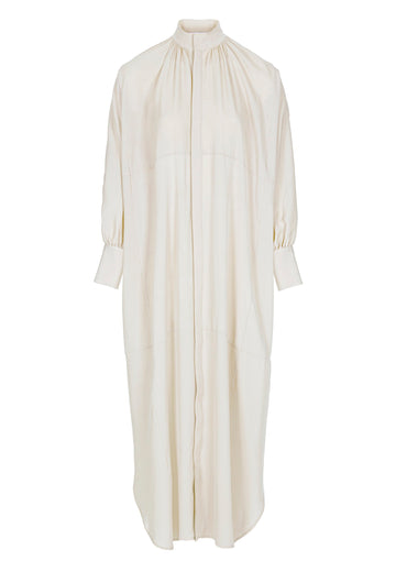 Silk maxi shirt-dress. Features turtleneck, snap buttons and adjustable cuffs. Fits oversized.
