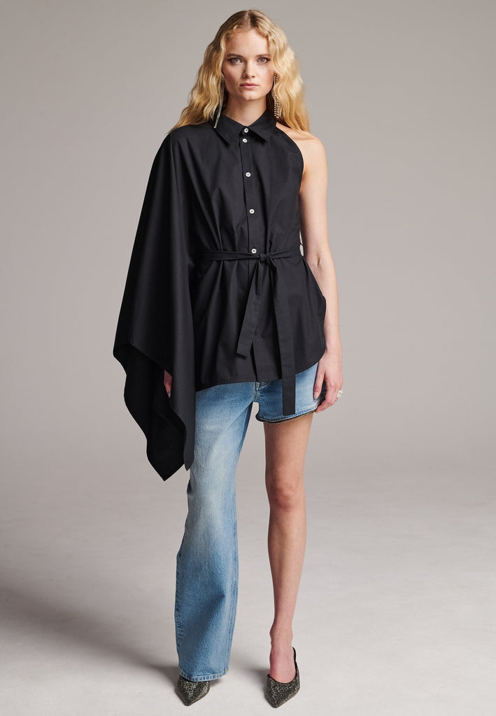 Our Square asymmetric shirt is an elegant choice for special events as well as your casual go-to. One shoulder big kimono sleeve, one detachable button-off sleeve. Designed for a relaxed/oversized fit. Use the tie belt to cinch in at the waist. Detailed with six-hole buttons. Cut from crispy 100% cotton poplin. Made in Lithuania.