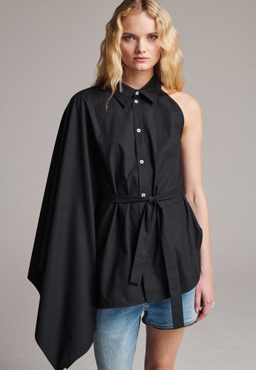 Our Square asymmetric shirt is an elegant choice for special events as well as your casual go-to. One shoulder big kimono sleeve, one detachable button-off sleeve. Designed for a relaxed/oversized fit. Use the tie belt to cinch in at the waist. Detailed with six-hole buttons. Cut from crispy 100% cotton poplin. Made in Lithuania.