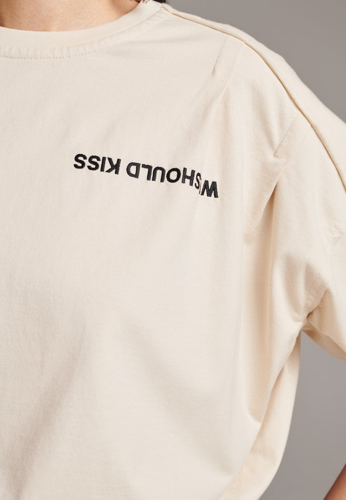 What better way to master your look than with this boxy fit tee. Embroidered with the FRENKEN “We Should Kiss” slogan, detailed with inside-out seams and the exclusively made "Love Care label". Drop shoulders, straight hem and crew neckline. Made from washed soft cotton jersey. What is not to love?