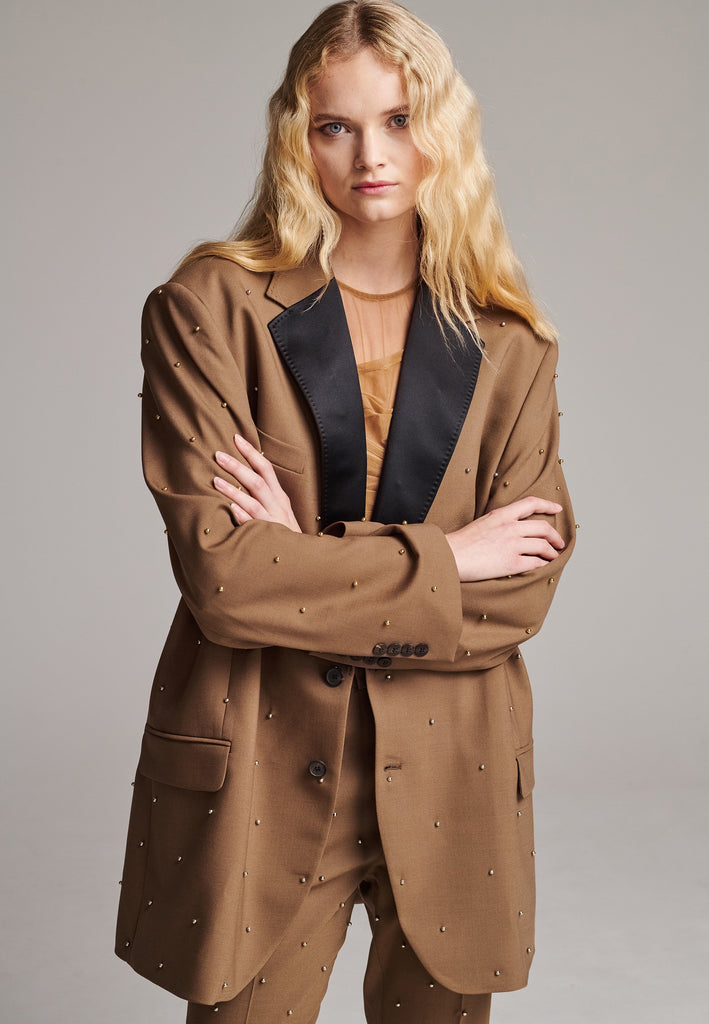 XXXL oversized blazer. To be worn as a coat/blazer, you will grab this piece to make every outfit stylish. Studded at the front panel. Perfectly tailored with satin lapels and hornen buttons. Cut from summer wool, detailed studded blazer. Made in Portugal.